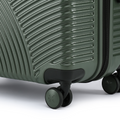 Dark green suitcase bottom with ribbed texture and front spinner wheels