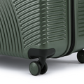 Dark green hard-shell suitcase bottom with corner guard and rolling wheel