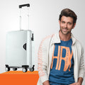 Light gray hard-shell suitcase with telescopic handle and spinner wheels