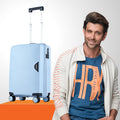 Set of 2 polypropylene wheeled suitcases, light blue hardshell with corner wheels
