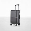 Hard-shell polycarbonate trolley luggage, dark grey, side view with zipper details and wheels