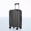 Hard-shell polycarbonate trolley suitcase, dark grey shell, telescopic handle and spinner wheels
