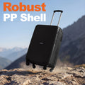 HRX cabin suitcase, black hard-shell with telescopic handle and 4 rolling wheels, angled.