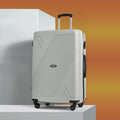 Large polypropylene suitcase, white, rear view with telescopic handle and four wheels.