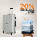 Large polypropylene suitcase, light gray, front view with wheels and telescopic handle.