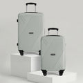Pair of light hard-shell suitcases with telescopic handles and four wheels