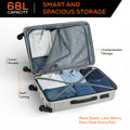 Open hard-shell suitcase showing lined interior, compression straps and compartments
