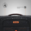 Close-up of black soft-sided trolley with water droplets and front zipper pocket