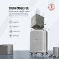 Polypropylene cabin spinner suitcase in light gray standing with four rolling wheels