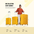 Yellow 8-wheel spinner suitcase shown alongside two other sizes