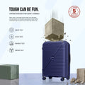 Medium blue poly spinner suitcase, ridged shell, 8 wheels, front view.