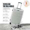Large check-in trolley with telescopic handle, light grey shell and 8 wheels.