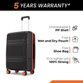 Black hard-shell suitcase with telescopic handle, red trim, and rolling wheels