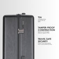 Hard-shell trolley suitcase side view with TSA combination lock and secure latch, dark grey