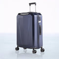 Hard shell polycarbonate trolley luggage in dark blue with side handle and four spinner wheels
