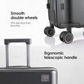 Hard-shell polycarbonate trolley suitcase with telescopic handle and double wheels, dark