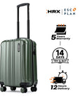 Cabin suitcase with extended handle, dark green hard-shell and four spinner wheels