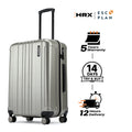 Hard-shell check-in suitcase, silver with vertical ribbed sides and top carry handle
