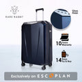 Hard-shell trolley luggage, gloss finish in dark blue, front-right view with handle