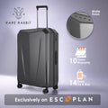 Hard shell trolley suitcase in dark grey, with top handle and spinner wheels