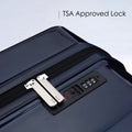 Hard-shell polycarbonate trolley suitcase close-up of TSA lock within zipper compartment