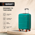 Teal small cabin suitcase standing on four orange wheels with telescopic handle and ribbed shell