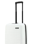 Small white hard-shell cabin suitcase with black telescopic handle and ridged texture