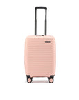 Peach small cabin suitcase front view with badge detail and textured shell