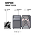 Open cabin suitcase interior with compression straps and zippered compartments