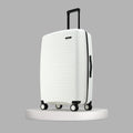Hard-sided luggage suitcase, white with black trim, upright on 8 wheels