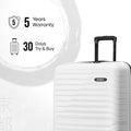 White hard-shell suitcase with top handle and ribbed side panels