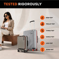Grey hard-shell medium spinner suitcase with front pocket and telescopic handle