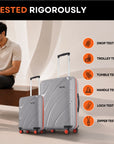 Two grey hard-shell rolling suitcases with telescopic handles and red-accent wheels