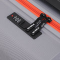 Small cabin suitcase top panel with black lock and red zipper trim