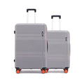 Hard-shell luggage set of 3, two grey suitcases side by side with telescopic handles