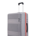 Hard-shell luggage set of 3, grey suitcase side view with telescopic handle and orange edge