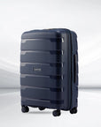 Medium check-in trolley suitcase, navy blue polypropylene shell with spinner wheels
