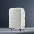 Medium check-in trolley suitcase, light grey polypropylene shell with spinner wheels