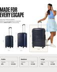 Dark blue rolling trolley set with 4 wheels each, three sizes shown, upright