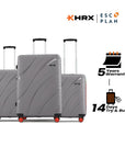 Hard-shell luggage set of three, grey with telescopic handles and red wheels