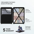 Open silver suitcase interior with organized packing compartments and pockets