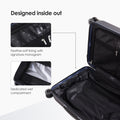 Hard-shell polycarbonate trolley luggage interior with wet compartment and zip pockets