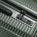 Medium check-in suitcase lock and number keypad on dark green shell