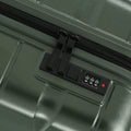 Green small cabin suitcase TSA-style number lock panel on zip pocket