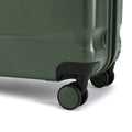 Green hard-shell suitcase with corner wheel and textured base