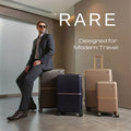 Beige and dark hard-shell trolley suitcases with telescopic handles