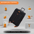 Black soft body spinner trolley with front pocket and four spinner wheels, angled view