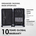 Dark hard-shell suitcase opened, dual compartments with detachable toiletry hanger and wet pouch
