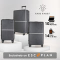 Hard shell trolley suitcase set in dark grey, with top handle and spinner wheels