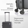 Dark grey hard-shell polycarbonate trolley suitcase with metallic rim wheels and telescopic handle.